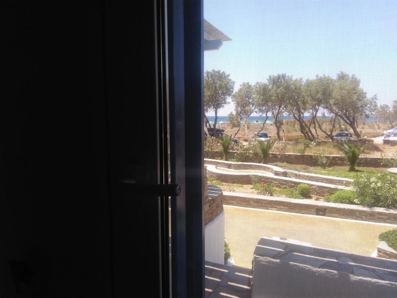 Nostos Beachfront Apartments & Studios Агиос Йоанис Екстериор снимка