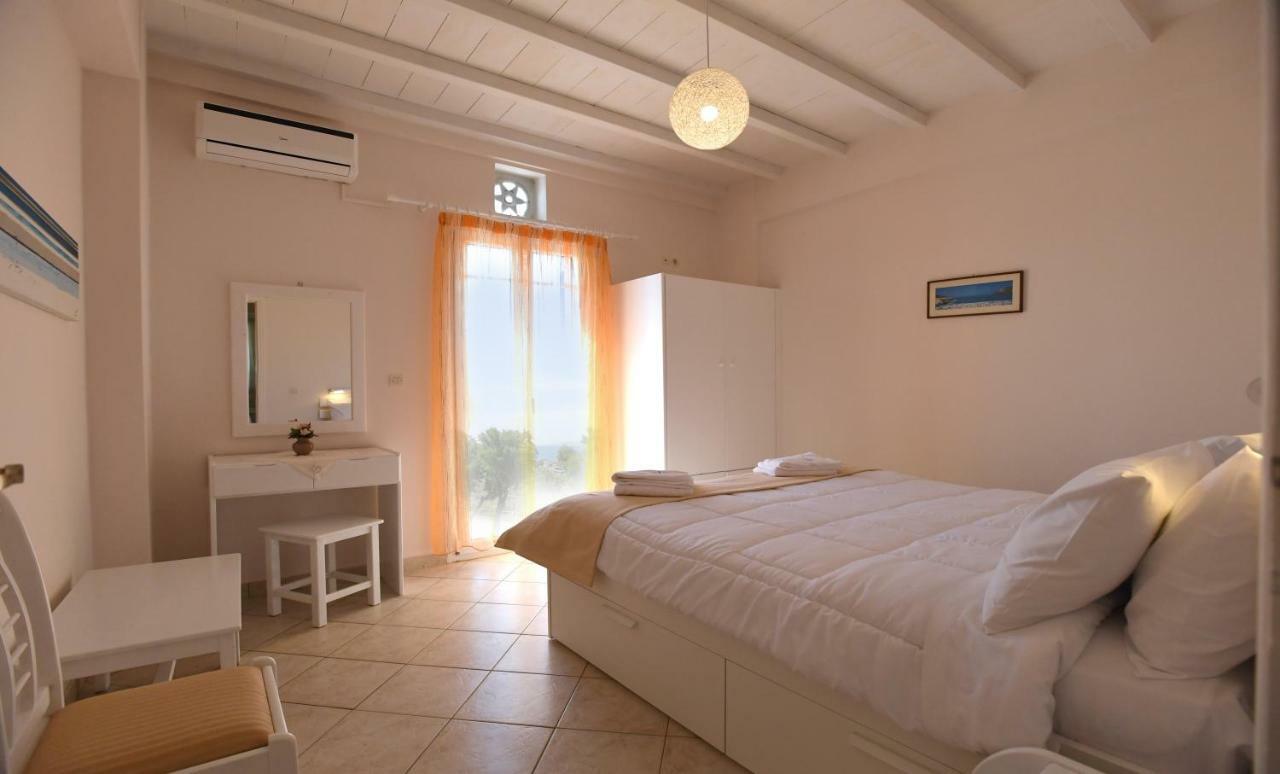 Nostos Beachfront Apartments & Studios Агиос Йоанис Екстериор снимка